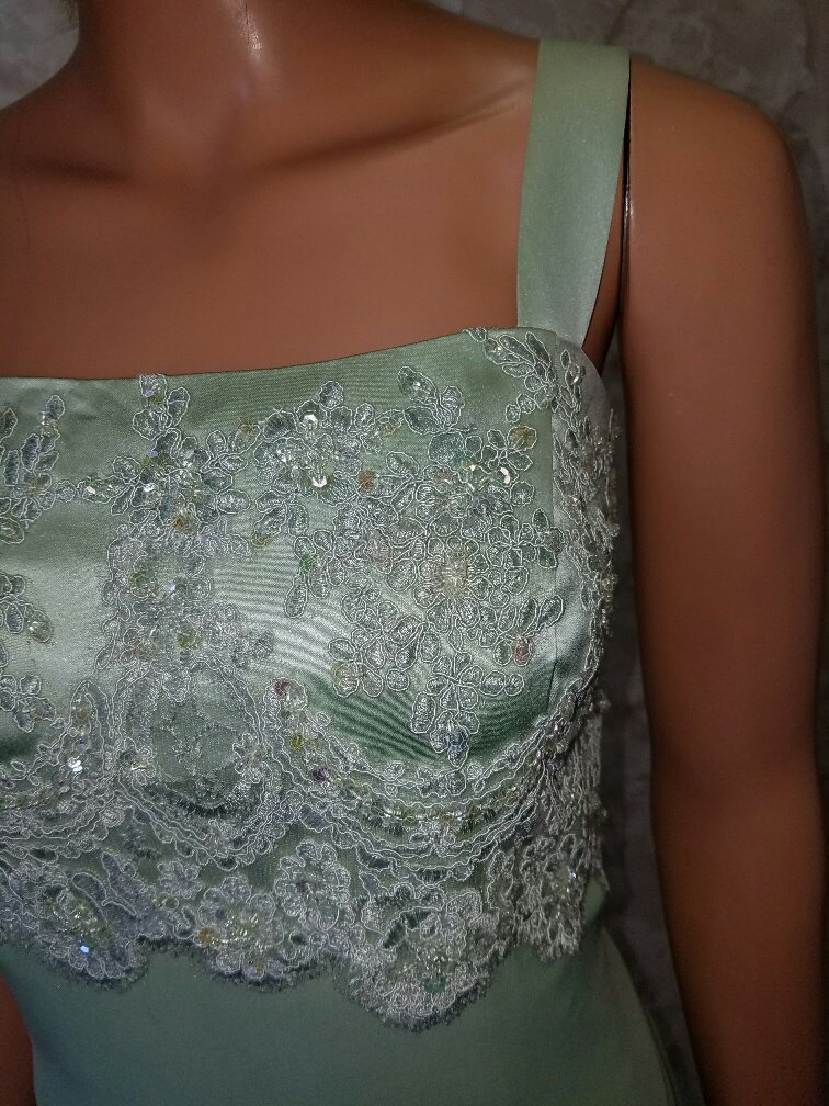 green mothers dress and jacket